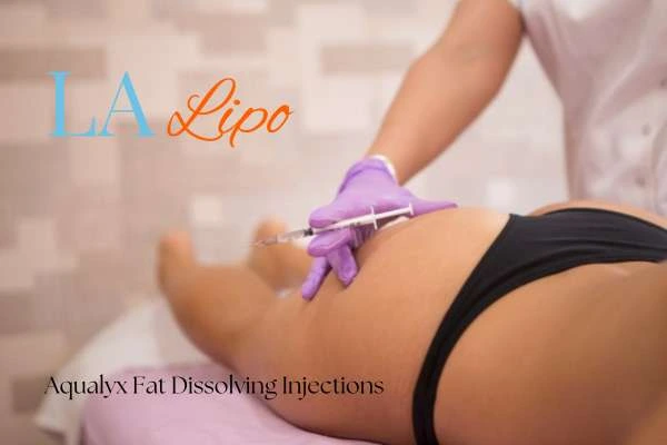 Woman having fat dissolving injections Sutton on thighs